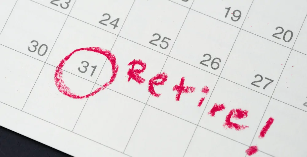 Calendar with a date circled in red and a note reading “Retire!”